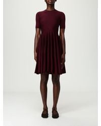 Alaïa - Skater Flared Wool Mini Dress - Lyst