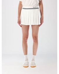 Sporty & Rich - Sporty &Amp Rich Pleated Tennis Mini Skirt With Contrasting Embroidered Logo - Lyst