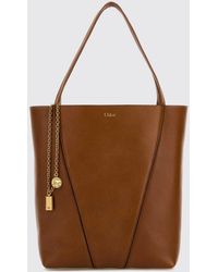 Chloé - Chlo&Eacute Spin Grained Calfskin Tote Bag With Logo Charm - Lyst