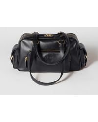 Miu Miu - Pocket Tasche Mit Logo-Prägung - Lyst