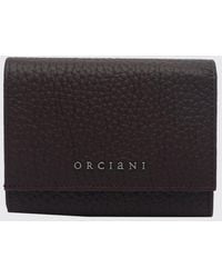 Orciani - Bifold-Brieftasche Aus Gehämmertem Kalbsleder Mit Patte - Lyst