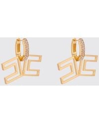 Elisabetta Franchi - Tone Metal Dangle Earrings With Monogram And Rhinestones - Lyst