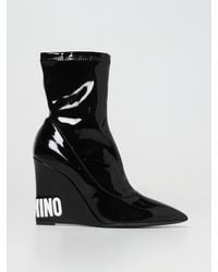Moschino - Flache Stiefeletten Damen - Lyst