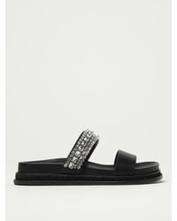 Jimmy Choo - Flache Sandalen Damen - Lyst