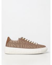 Versace - Sneakers in tessuto con logo jacquard - Lyst