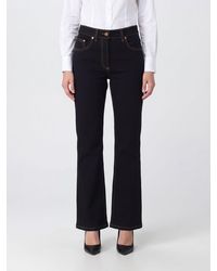 Versace - Mid-Rise Flared Jeans - Lyst