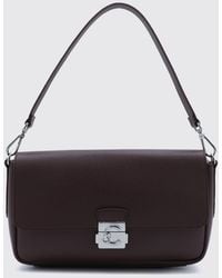 Coccinelle - C-Me Lock Pebbled Leather Shoulder Bag With Buckle Closure - Lyst