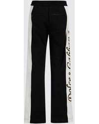 Dolce & Gabbana - Pantaloni in jersey di cotone con bande logate a contrasto - Lyst