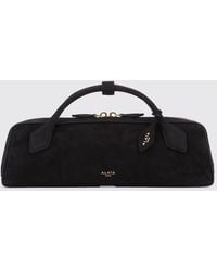 Alaïa - Le Teckel Suede Sheepskin Handbag With Logo Charm - Lyst