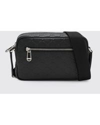 Gucci - Gg Emblem Leather Bag With Embossed Gg Monogram - Lyst