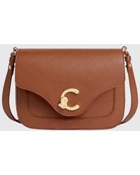 Coccinelle - C-Me Hammered Leather Bag - Lyst