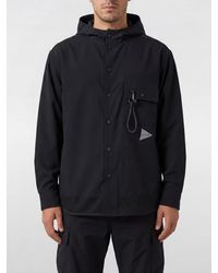 and wander - Polyester Windbreaker Jacket With Hood And Patch Pockets - Lyst