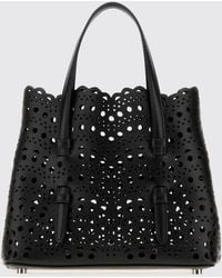 Alaïa - Small Mina Perforated Smooth Calfskin Leather Handbag - Lyst