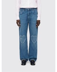 Moschino - Wide-Leg Denim Jeans With Applied Hearts - Lyst
