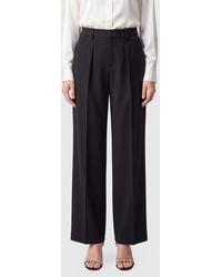 N°21 - High-Waisted Tailored Wide Leg Crêpe Trousers With Pleats By - Lyst