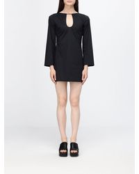 Liviana Conti - Long-Sleeved Crew Neck Sheath Mini Dress With A Slim Fit - Lyst