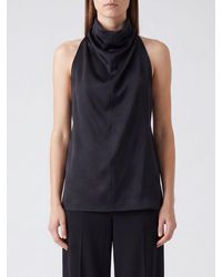KHAITE - Sleeveless Draped Satin Turtleneck Top - Lyst