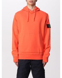 orange stone island tracksuit