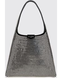 Alaïa - Studded Leather Hobo Bag With Flat Handle - Lyst