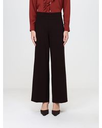 Liviana Conti - Oscar High-Waisted Wide-Leg Flare Crêpe Trousers - Lyst