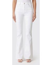 PAIGE - Flared Cotton Denim Jeans - Lyst