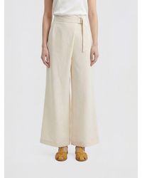 Brunello Cucinelli - Flared Linen Blend Trousers - Lyst
