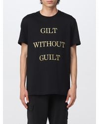 Moschino - Cotton T-Shirt With Slogan - Lyst