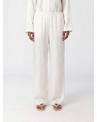 TOTEME - High-Waisted Silk Palazzo Trousers With Logo Print - Lyst