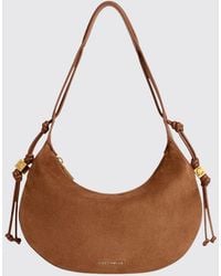 Coccinelle - Thess Suede Shoulder Bag With Metallic Logo - Lyst