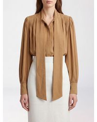 KHAITE - Pussy-Bow Collar Pure Silk Long-Sleeved Shirt - Lyst