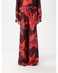 McQueen - Seiden-Twill-Flammenlilie Weitbeinige Hose - Lyst