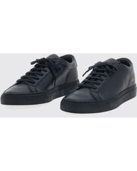 Common Projects - Achilles Low Smooth Calfskin Sneakers With Laminated Logo - Lyst