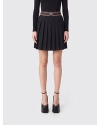 Versace - Pleated Wool And Mohair Mini Skirt With High Logo Waistband - Lyst
