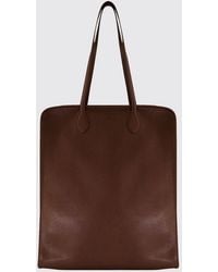 Celine - The Vertical Smooth Lambskin Tote Bag With Double Handles And Logo - Lyst