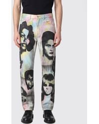 Versace - Straight-Leg Cotton Denim Jeans With All-Over Graphic Print - Lyst