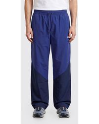 New Balance - Nylon Jogging Trousers - Lyst