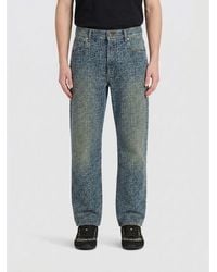 Balmain - Cotton Denim Monogram Jeans - Lyst