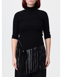 SIMONA CORSELLINI - Ribbed Wool Short-Sleeved Turtleneck With Fringes - Lyst