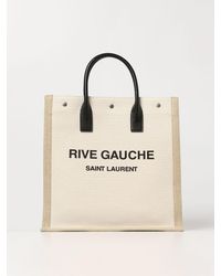 Saint Laurent - Borsa Rive Gauche in canvas e pelle con logo stampato - Lyst