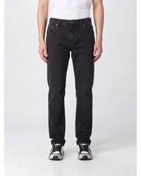 Dolce & Gabbana - Dolce &Amp Gabbana Slim Fit Stretch Denim Jeans With Logo Plaque On The Back - Lyst
