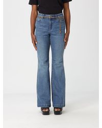 Michael Kors - Flare Jeans With Chain Belt - Lyst