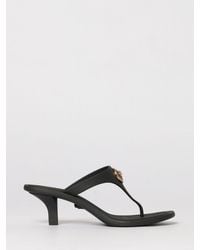 Versace - Flache Sandalen Damen - Lyst