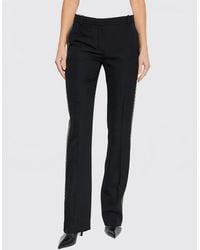 Versace - Wool Trousers With Studs And Rhinestones - Lyst