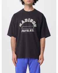 Champion - Relaxed Fit Cotton T-Shirt With Front Logo And Slogan Print - Lyst