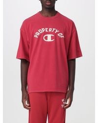 Champion - Relaxed Fit Cotton T-Shirt With Front Logo And Slogan Print - Lyst