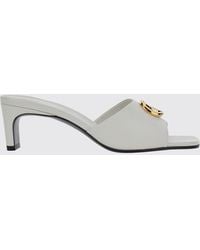 Gucci - Nappa Leather Mules With Mid-Heel And Gg Monogram Hardware - Lyst