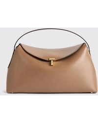TOTEME - T-Lock Leather Handbag With A Flared Shape And Turn-Lock Closure - Lyst