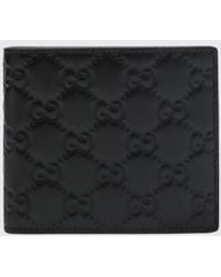 Gucci - Gg Emblem Embossed Leather Wallet - Lyst
