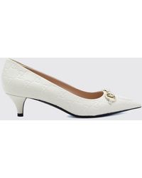 Gucci - Leather Pumps With Embossed Gg Monogram - Lyst