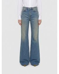 Saint Laurent - Flared Cotton Denim Jeans - Lyst